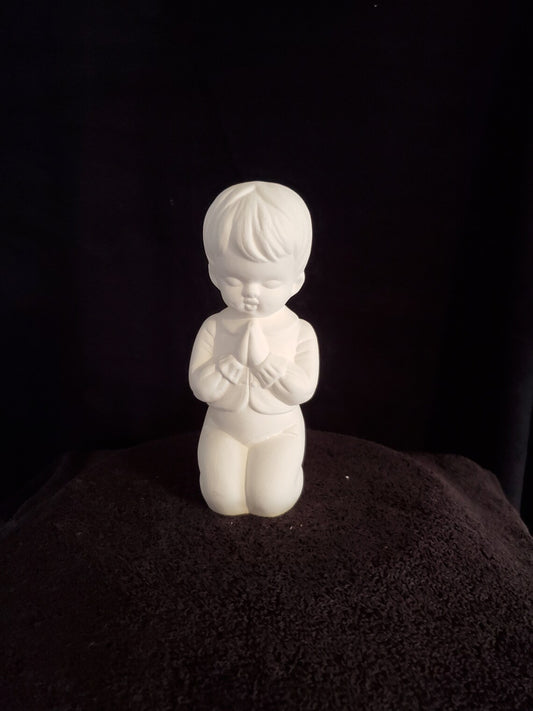 Kneeling Praying Boy image 0